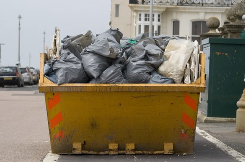 A garbage collection truck on a South London street