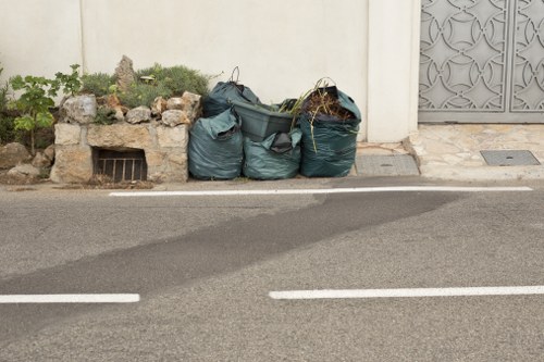 Professional house clearance team in South London removing furniture